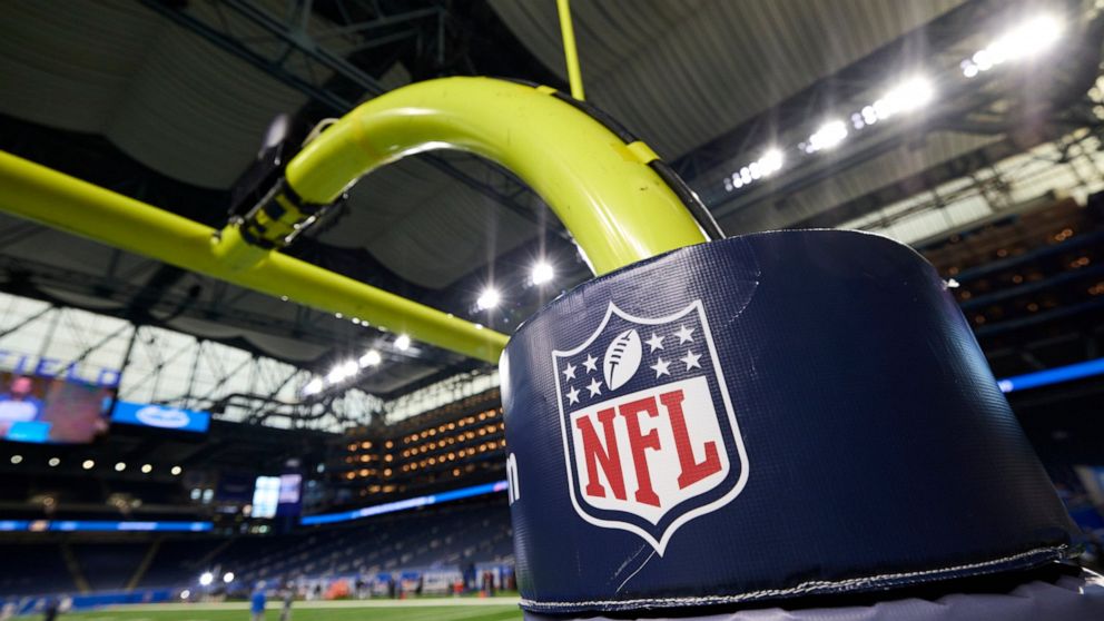 FILE - In this Aug. 13, 2021, file photo, an NFL logo is displayed on a goal post pad during an NFL preseason football game between the Buffalo Bills and Detroit Lions in Detroit. The NFL has instituted some policy changes to the Rooney Rule designed