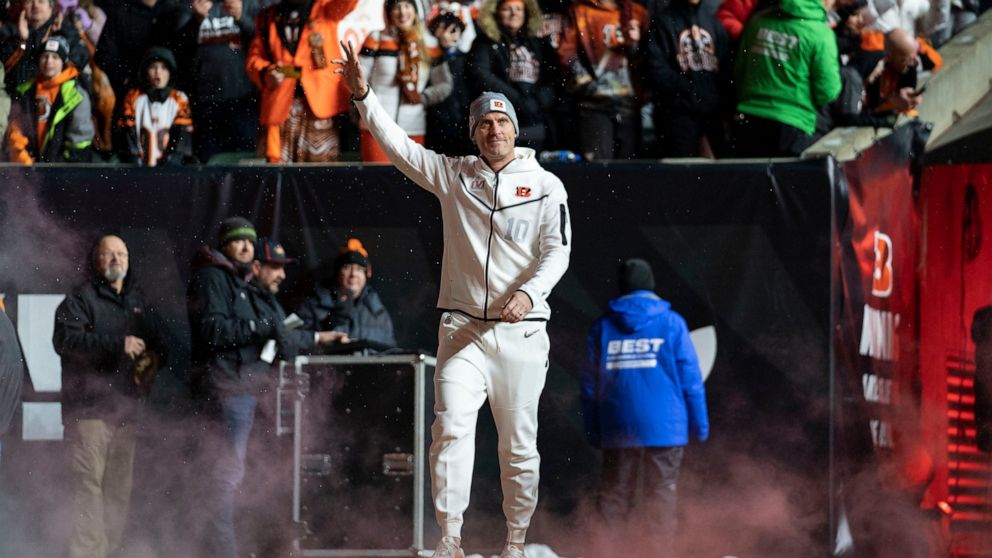Cincinnati Bengals punter Kevin Huber (10) enters the field during the Super Bowl LVI Opening Night Fan Rally Monday, Feb. 7, 2022, in Cincinnati. Huber has been a Bengals fan all his life. He grew up in Cincinnati, went to college there and rooted f