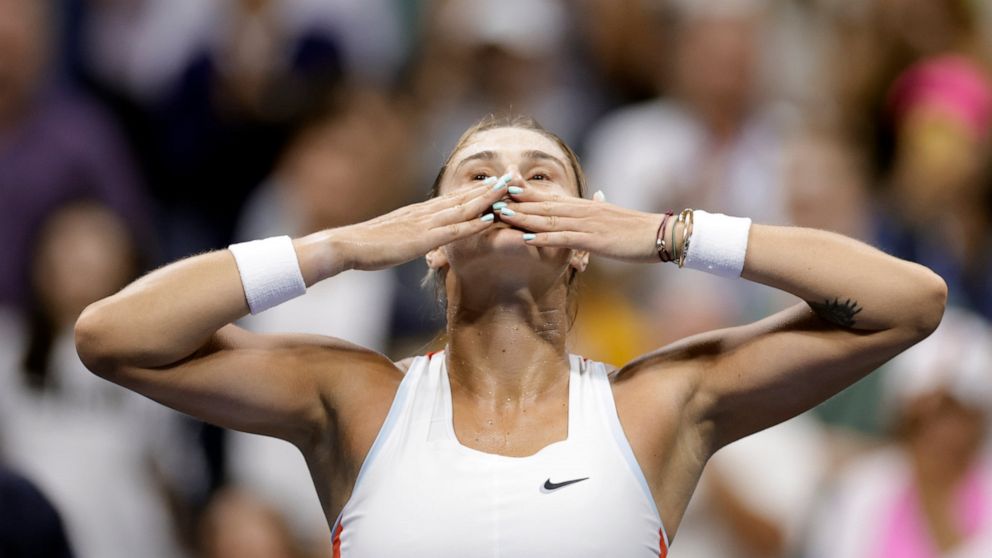Aryna Sabalenka, of Belarus, blows kisses to the crowd after defeating Danielle Collins, of the United States, during the fourth round of the U.S. Open tennis championships, Monday, Sept. 5, 2022, in New York. (AP Photo/Adam Hunger)