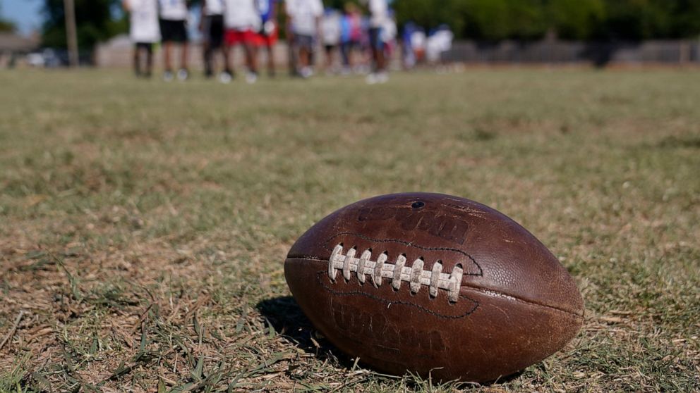 A middle school football team practices Wednesday, Sept. 28, 2022, in Oklahoma City. Oklahoma has a new law that bans public elementary, middle school, high school and college athletes from competing on the sports teams of their gender identity if it