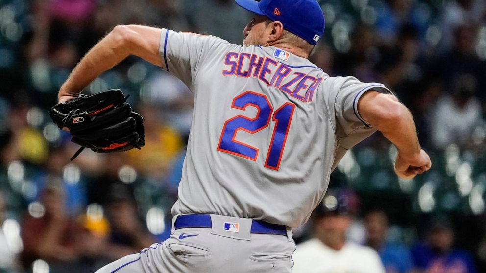 New York Mets starter Max Scherzer throws during the first inning of a baseball game against the Milwaukee Brewers Monday, Sept. 19, 2022, in Milwaukee. (AP Photo/Morry Gash)