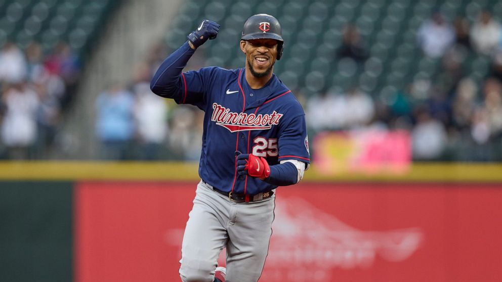 Minnesota Twins'. Byron Buxton rounds the bases after hitting a two-run home run off a pitch from Seattle Mariners starter Chris Flexen during the first inning of a baseball game, Monday, June 13, 2022, in Seattle. (AP Photo/John Froschauer)