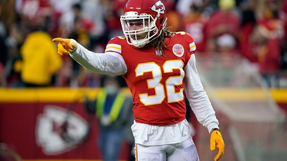 FILE - Kansas City Chiefs free safety Tyrann Mathieu (32) points during the first half of an NFL football game against the Pittsburgh Steelers on Dec. 26, 2021, in Kansas City, Mo. The New Orleans Saints and Mathieu have agreed to a three-year, $33 m