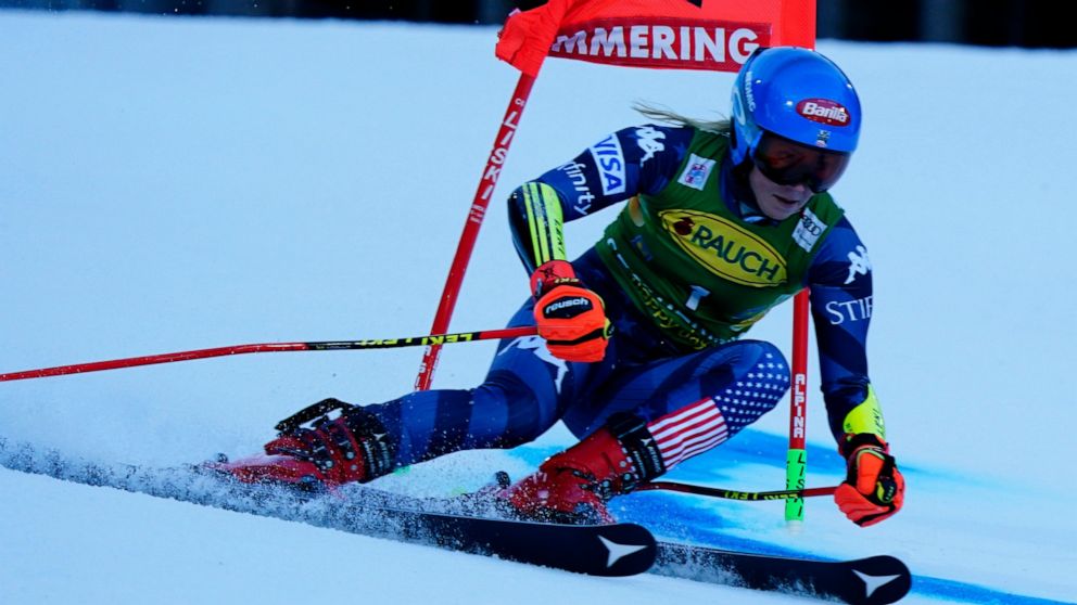 United States' Mikaela Shiffrin speeds down the course during an alpine ski, women's World Cup giant slalom, in Semmering, Austria, Tuesday, Dec. 27, 2022. (AP Photo/Piermarco Tacca)