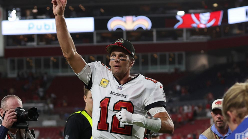 Tampa Bay Buccaneers quarterback Tom Brady (12) waves to spectators after an NFL football game between the Los Angeles Rams and Tampa Bay Buccaneers, Sunday, Nov. 6, 2022, in Tampa, Fla. The Buccaneers defeated the Rams 16-13. Brady become the first 