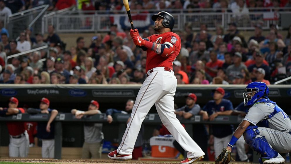 Minnesota Twins' Nelson Cruz watches his solo home run against the Kansas City Royals during the second inning of a baseball game Saturday, Aug. 3, 2019, in Minneapolis. (Aaron Lavinsky/Star Tribune via AP)
