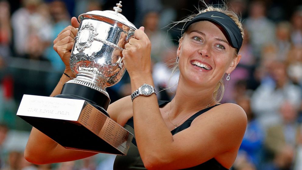 FILE - In this Saturday June 9, 2012 file photo, Maria Sharapova of Russia holds the trophy after winning the women's final match against Sara Errani of Italy at the French Open tennis tournament in Roland Garros stadium in Paris. Two-time French Ope