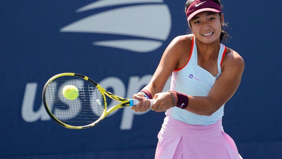 Alexandra Eala, of the Philippines, returns a shot to Lucie Havlickova, of the Czech Republic, during the junior girls singles final of the U.S. Open tennis championships, Saturday, Sept. 10, 2022, in New York. (AP Photo/Matt Rourke)
