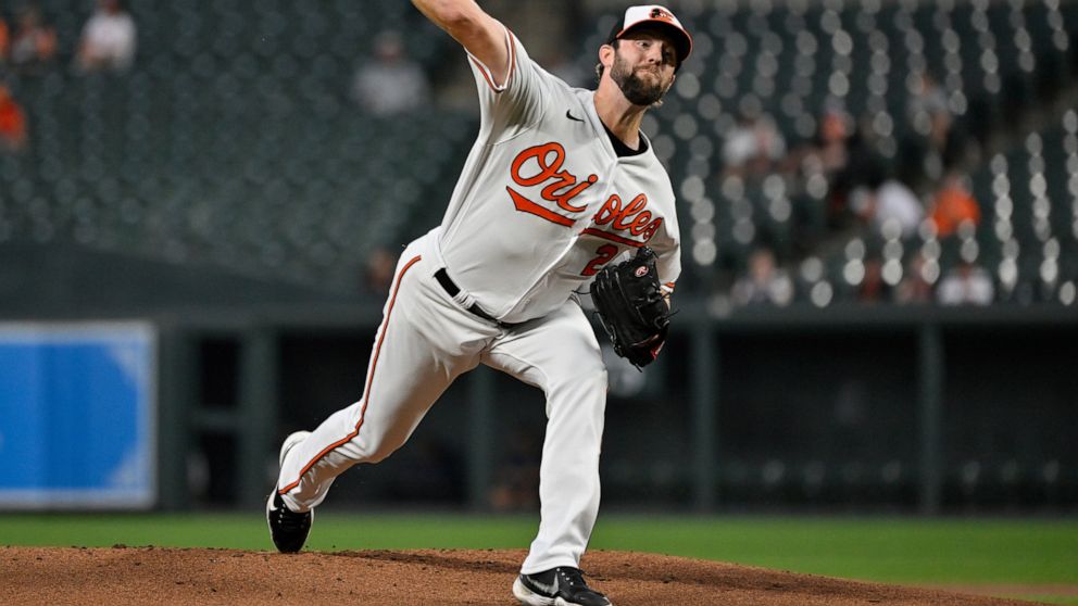 Baltimore Orioles starting pitcher Jordan Lyles throws during the first inning of the team's baseball game against the Detroit Tigers, Wednesday, Sept. 21, 2022, in Baltimore. (AP Photo/Terrance Williams)