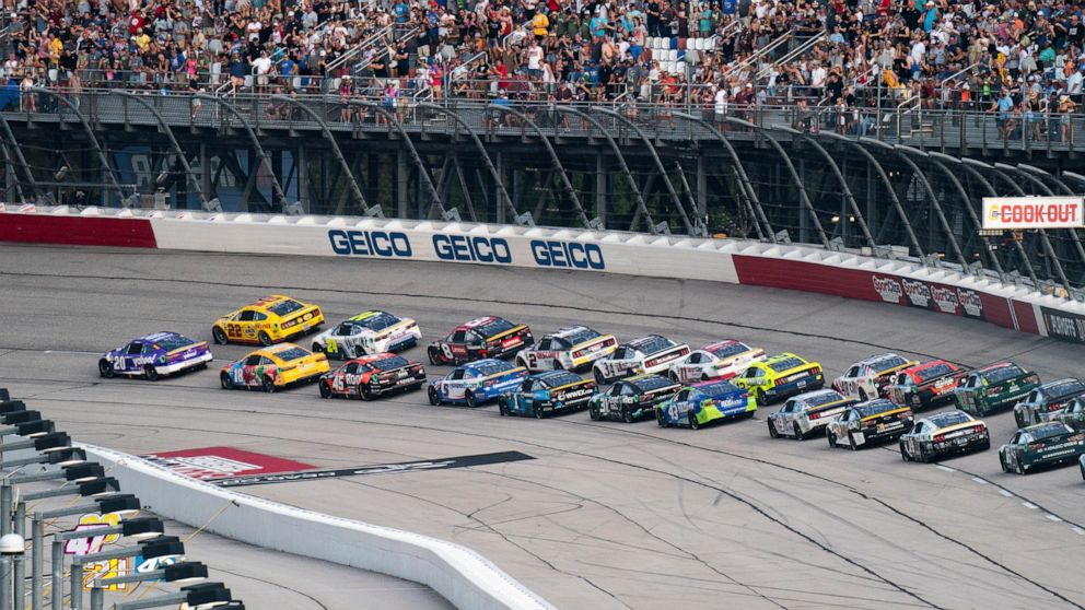 Drivers compete at the start of the NASCAR Southern 500 auto race, Sunday, Sept. 4, 2022, in Darlington, S.C. (AP Photo/Sean Rayford)