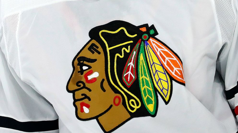 FILE - The Chicago Blackhawks logo is shown on a jersey in Raleigh, N.C., in this May 3, 2021, file photo. The Chicago Blackhawks have hired a former federal prosecutor to conduct an independent review of allegations that a former player was sexually