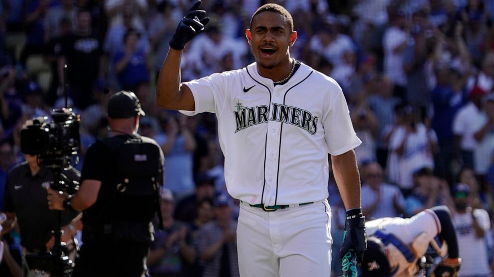 American League's Julio Rodriguez, of the Seattle Mariners, reacts during the MLB All-Star baseball Home Run Derby, Monday, July 18, 2022, in Los Angeles. (AP Photo/Mark J. Terrill)