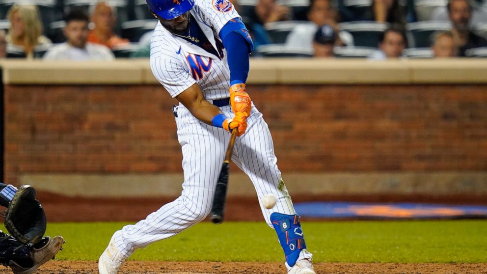 New York Mets' Starling Marte singles to drive in the winning run against the New York Yankees during the ninth inning of a baseball game Wednesday, July 27, 2022, in New York. (AP Photo/Frank Franklin II)