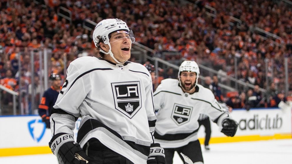 Los Angeles Kings' Trevor Moore (12) celebrates a goal against the Edmonton Oilers during the first period of Game 1 of an NHL hockey Stanley Cup first-round playoff series, Monday, May 2, 2022 in Edmonton, Alberta. (Jason Franson/The Canadian Press 