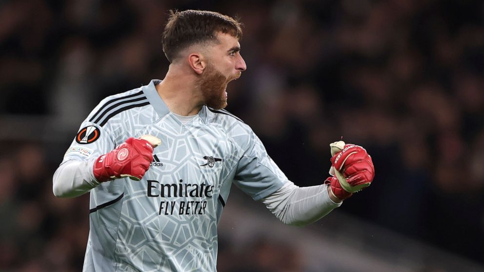 Arsenal's goalkeeper Matt Turner celebrates a goal from his teammate Granit Xhaka against PSV during the Europa League soccer match between Arsenal and PSV at Emirates stadium in London, Thursday, Oct. 20, 2022. (AP Photo/Ian Walton)