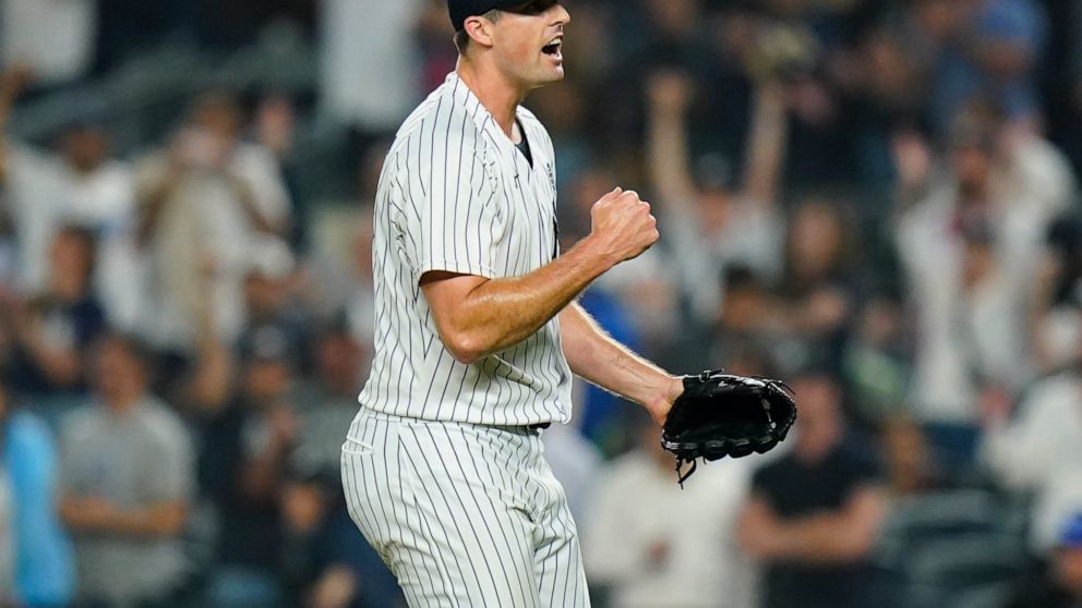 New York Yankees relief pitcher Clay Holmes celebrates after the second baseball game of the team's doubleheader against the Los Angeles Angels on Thursday, June 2, 2022, in New York. The Yankees won 2-1. (AP Photo/Frank Franklin II)