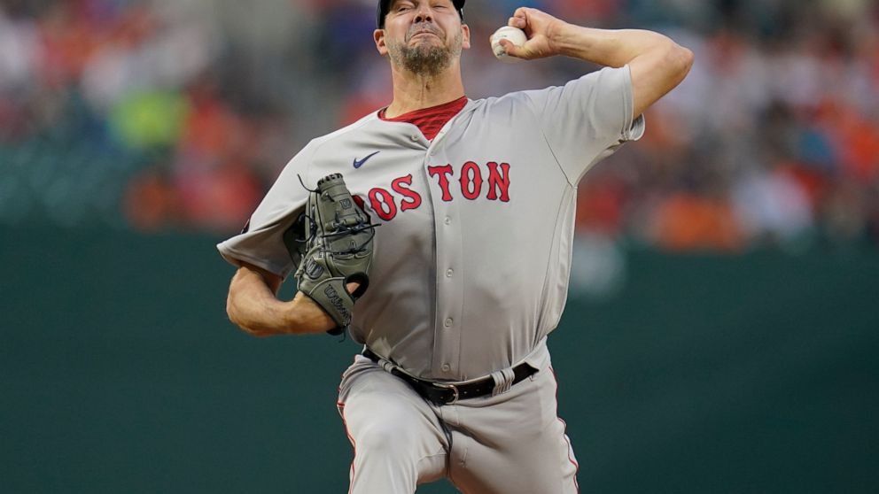 Boston Red Sox starting pitcher Rich Hill throws a pitch against the Baltimore Orioles during the second inning of a baseball game, Friday, April 29, 2022, in Baltimore. (AP Photo/Julio Cortez)