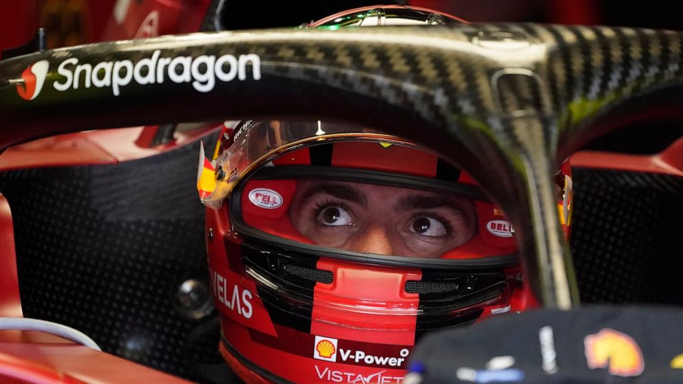 Ferrari driver Charles Leclerc of Monaco waits in his car for the start of the first practice session for the Formula One Miami Grand Prix auto race at the Miami International Autodrome, Friday, May 6, 2022, in Miami Gardens, Fla. (AP Photo/Darron Cu