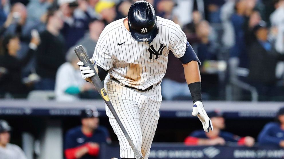 New York Yankees designated hitter Aaron Judge reacts after flying out against Boston Red Sox starting pitcher Brayan Bello during the fifth inning of a baseball game Sunday, Sept. 25, 2022, in New York. (AP Photo/Jessie Alcheh)