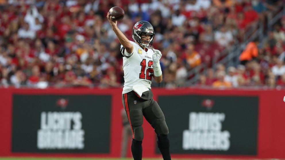 Tampa Bay Buccaneers quarterback Tom Brady (12) throws a pass during the first half of an NFL football game between the Los Angeles Rams and Tampa Bay Buccaneers, Sunday, Nov. 6, 2022, in Tampa, Fla. (AP Photo/Mark LoMoglio)