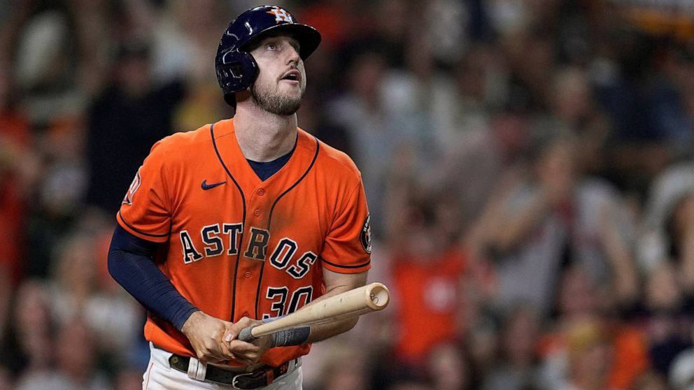 Houston Astros' Kyle Tucker watches his grand slam off Oakland Athletics relief pitcher Sam Moll during the fifth inning of a baseball game Friday, Aug. 12, 2022, in Houston. (AP Photo/Kevin M. Cox)