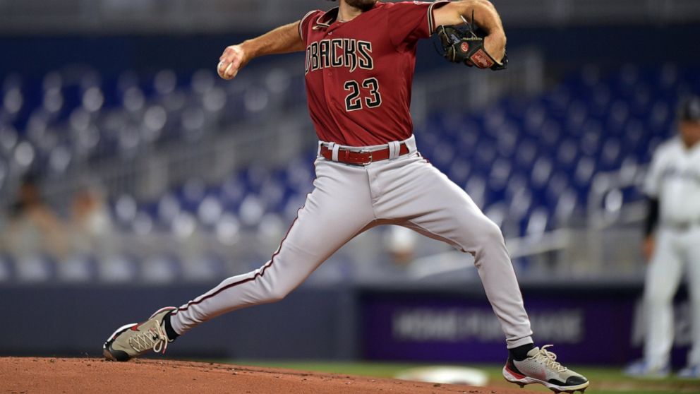 Arizona Diamondbacks starting pitcher Zac Gallen (23) delivers against the Miami Marlins during the first inning of a baseball game, Monday, May 2, 2022, in Miami. (AP Photo/Jim Rassol)