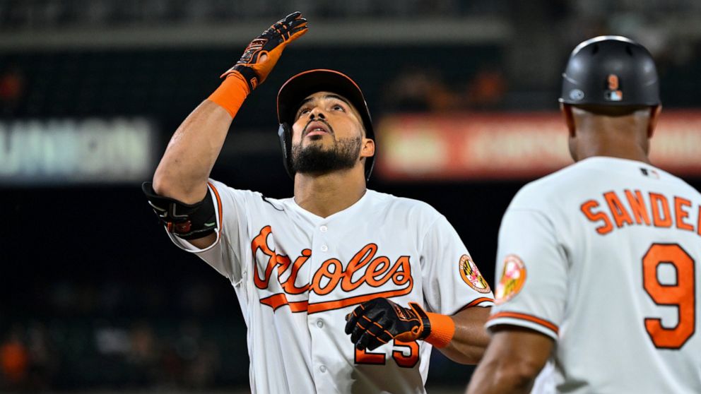 Baltimore Orioles' Anthony Santander gestures after hitting a single against Toronto Blue Jays starting pitcher Alek Manoah during the fifth inning of a baseball game, Tuesday, Aug. 9, 2022, in Baltimore. (AP Photo/Terrance Williams)