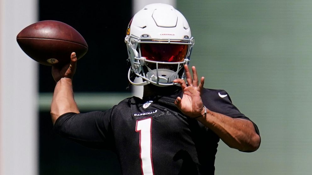 FILE - Arizona Cardinals quarterback Kyler Murray throws a pass as he takes part in drills at the NFL football team's practice facility Tuesday, June 14, 2022, in Tempe, Ariz. The Cardinals have shown improvement during quarterback Kyler Murray's fir