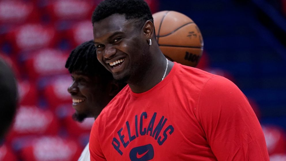 New Orleans Pelicans forward Zion Williamson (1) watches a shoot around before game six of an NBA basketball first-round playoff series against the Phoenix Suns, Friday, April 29, 2022 in New Orleans. (AP Photo/Gerald Herbert)