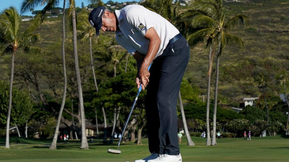 Matt Kuchar putts on the 13th green during the second round of the Sony Open PGA Tour golf event, Friday, Jan. 11, 2019, at Waialae Country Club in Honolulu. (AP Photo/Matt York)