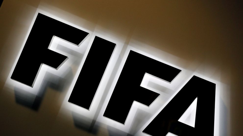 FILE - This Sept. 25, 2015 file photo shows the FIFA logo outside FIFA headquarters in Zurich, Switzerland. FIFA will hold talks with human rights groups about issues associated with expanding the 2022 World Cup in the Persian Gulf beyond host Qatar.