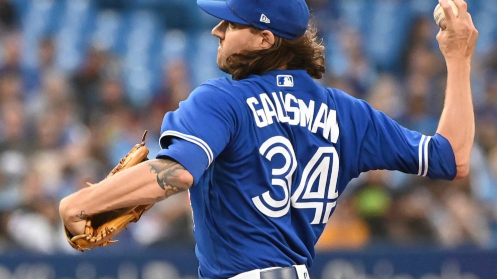 Toronto Blue Jays starting pitcher Kevin Gausman throws to a Chicago Cubs batter during the first inning of a baseball game Tuesday, Aug. 30, 2022, in Toronto. (Jon Blacker/The Canadian Press via AP)