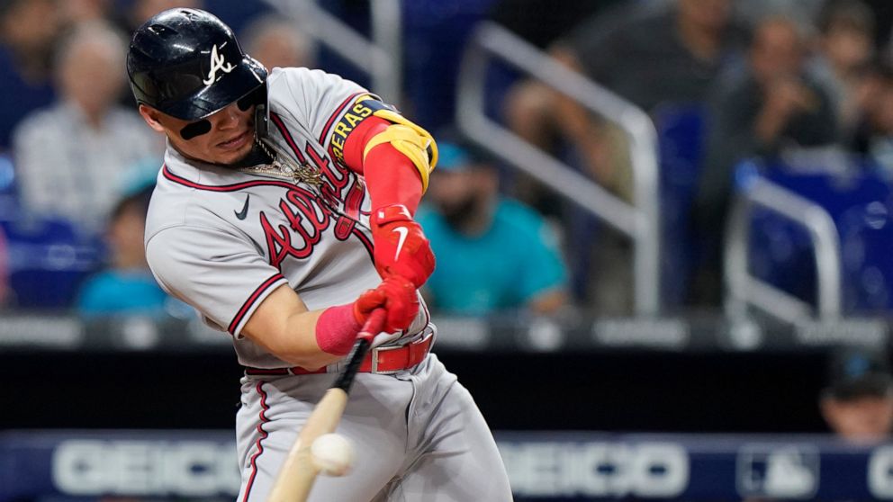 Atlanta Braves' William Contreras gets a base hit during the fourth inning of a baseball game against the Miami Marlins, Tuesday, Oct. 4, 2022, in Miami. (AP Photo/Wilfredo Lee)