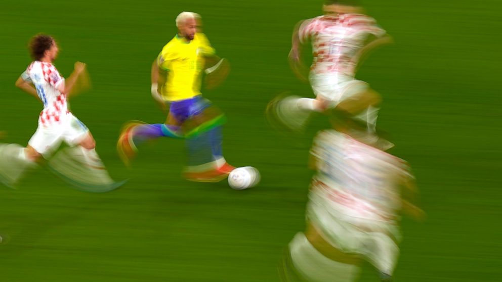 Brazil's Neymar, second left, controls the ball during the World Cup quarterfinal soccer match between Croatia and Brazil, at the Education City Stadium in Al Rayyan, Qatar, Friday, Dec. 9, 2022. (AP Photo/Pavel Golovkin)