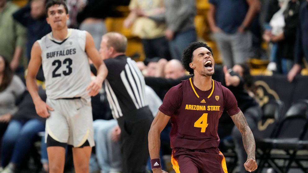 Arizona State guard Desmond Cambridge Jr. (4) reacts after hitting the winning 3-point basket as Colorado forward Tristan da Silva (23) looks on in the second half of an NCAA college basketball game Thursday, Dec. 1, 2022, in Boulder, Colo. (AP Photo