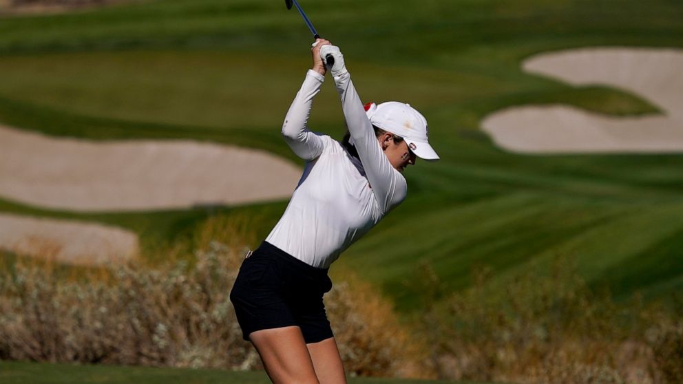 Stanford golfer Rachel Heck hits from the eighth tee during the NCAA college women's golf championship semifinal at Grayhawk Golf Club, Tuesday, May 24, 2022, in Scottsdale, Ariz. (AP Photo/Matt York)