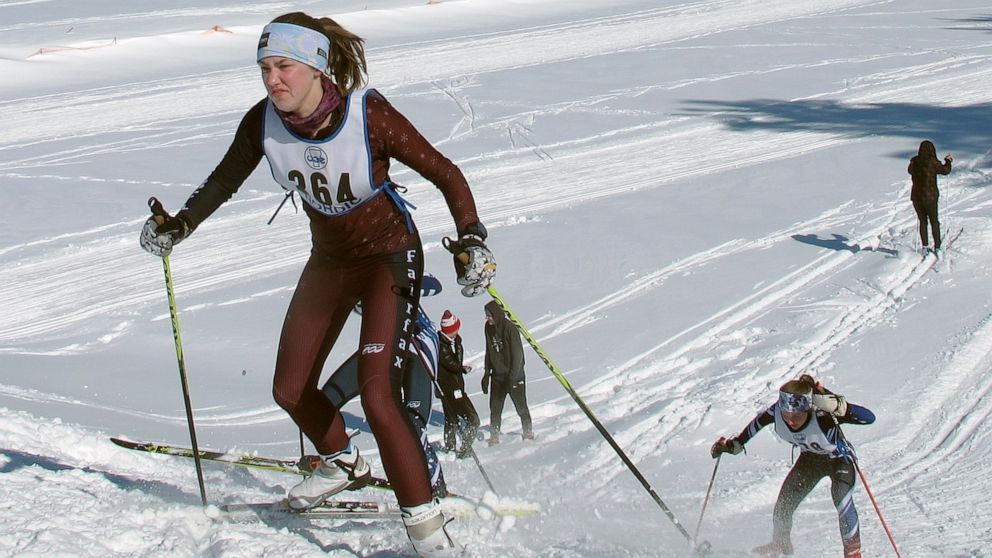 In this Feb. 8, 2020, photo, cross-country skiers from around Vermont compete in races at U-32 Middle & High School in East Montpelier, Vt. The ski racing community worldwide is starting to back away from the use of fluorinated waxes that contain che