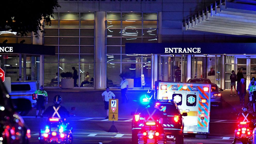 In this Monday, June 10, 2019 photo, police escort the ambulance carrying David Ortiz to Massachusetts General Hospital in Boston. Ortiz was back in Boston on Monday night for medical care, a day after authorities said the former Red Sox slugger affe