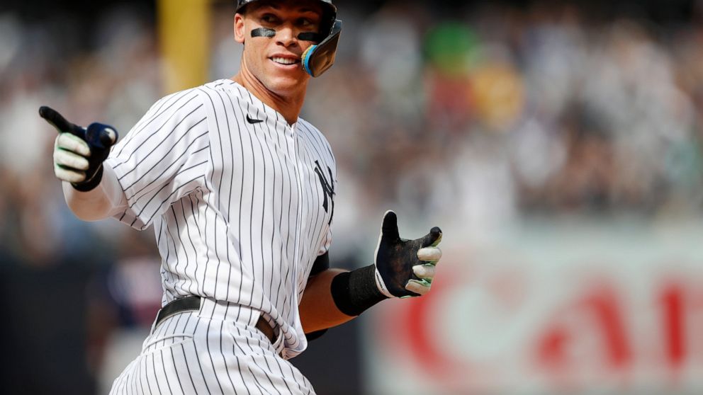 New York Yankees right fielder Aaron Judge (99) reacts while rounding the bases after hitting a home run against the Minnesota Twins during the sixth inning of a baseball game Monday, Sept. 5, 2022, in New York. (AP Photo/Noah K. Murray)