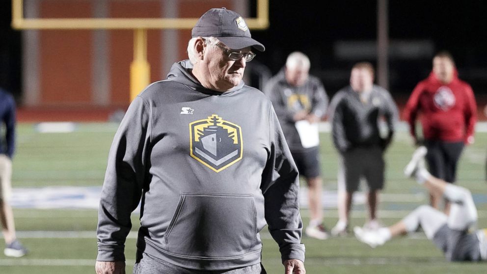 FILE - In this Jan. 11, 2019, photo released by the Alliance of American Football, San Diego Fleet head coach Mike Martz walks on a field as players stretch in San Antonio. Nearly 51 years ago, Martz took his future wife, Julie, on their first date t
