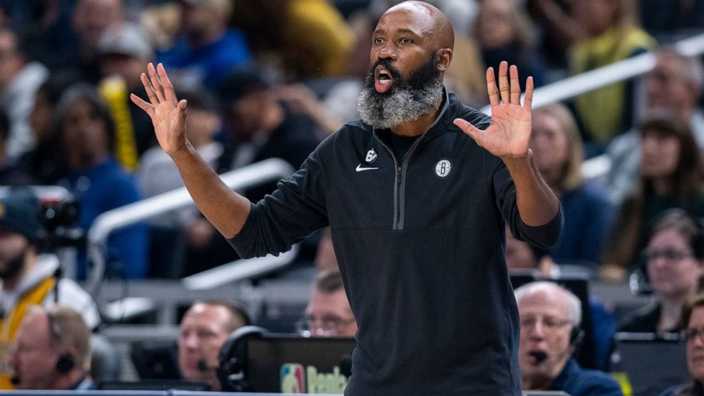 Brooklyn Nets coach Jacque Vaughn reacts to action on the court during the first half of the team's NBA basketball game against the Indiana Pacers in Indianapolis, Saturday, Dec. 10, 2022. (AP Photo/Doug McSchooler)