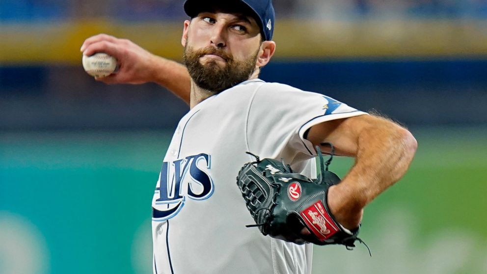 Tampa Bay Rays starting pitcher Michael Wacha goes into his windup against the Minnesota Twins during the first inning of a baseball game Friday, Sept. 3, 2021, in St. Petersburg, Fla. (AP Photo/Chris O'Meara)