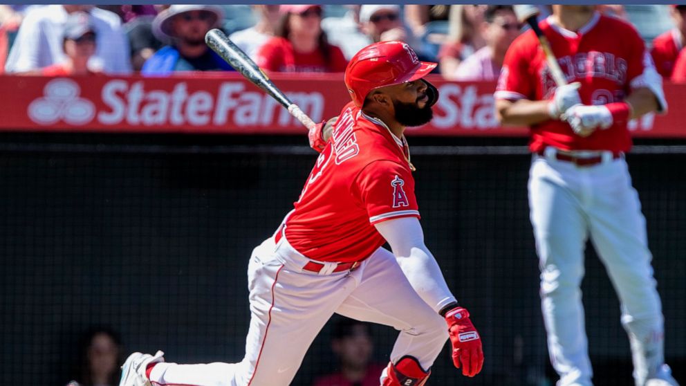 Los Angeles Angels' Luis Rengifo watches his two-run home run, his second of the game, against the Seattle Mariners during the third inning of a baseball game in Anaheim, Calif., Sunday, Sept. 18, 2022. (AP Photo/Alex Gallardo)