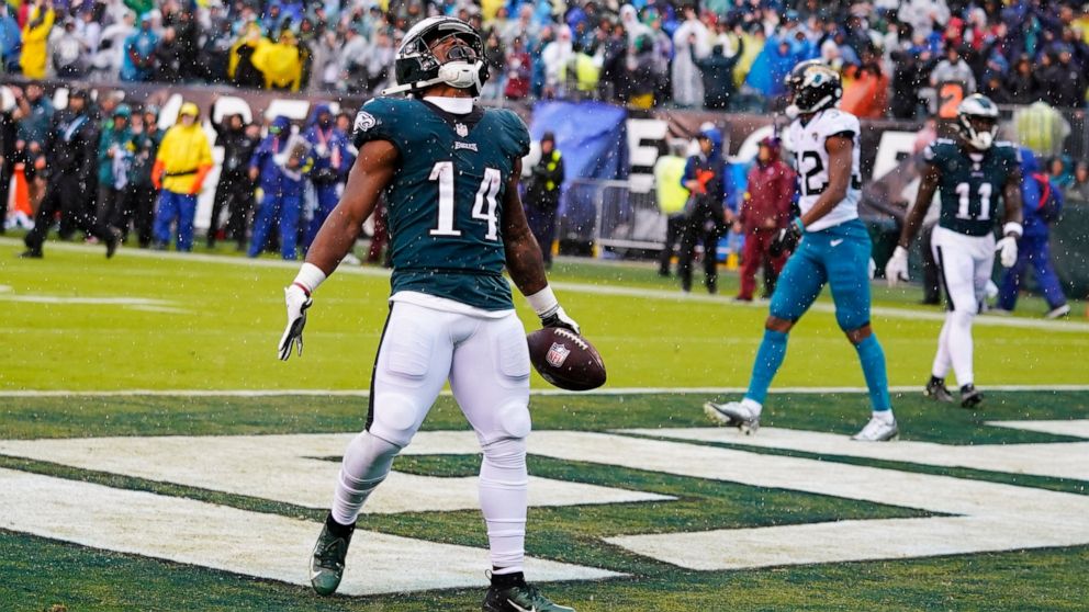 Philadelphia Eagles' Kenneth Gainwell celebrates scoring a touchdown during the first half of an NFL football game against the Jacksonville Jaguars on Sunday, Oct. 2, 2022, in Philadelphia. (AP Photo/Chris Szagola)