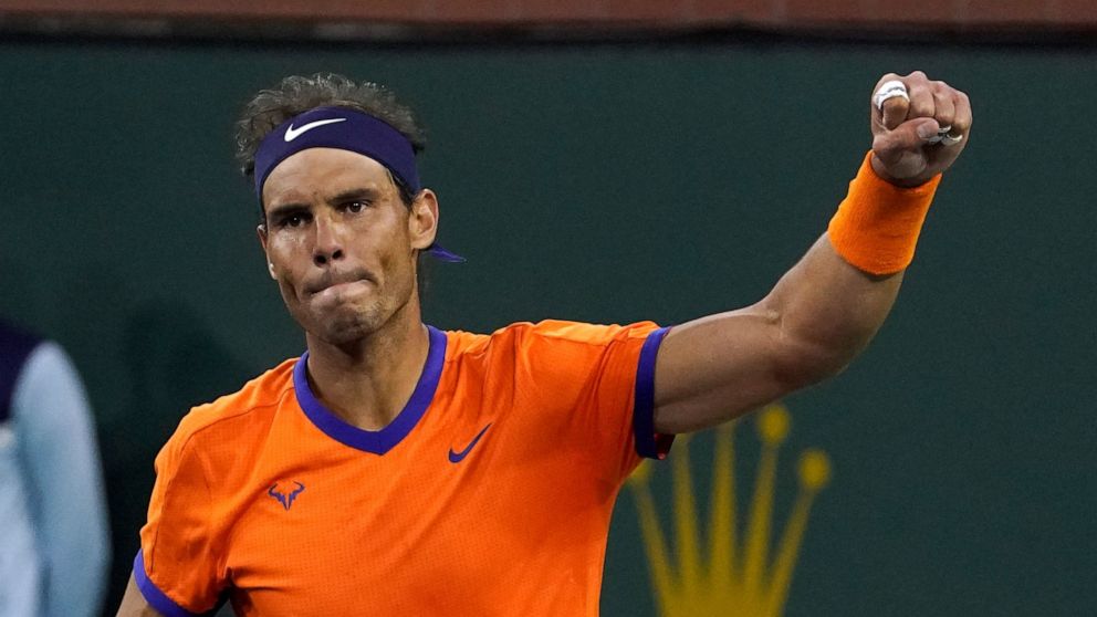 Rafael Nadal, of Spain, reacts after defeating Carlos Alcaraz, of Spain, during the men's singles semifinals at the BNP Paribas Open tennis tournament Saturday, March 19, 2022, in Indian Wells, Calif. Nadal won 6-4, 4-6, 6-3. (AP Photo/Mark J. Terrill)