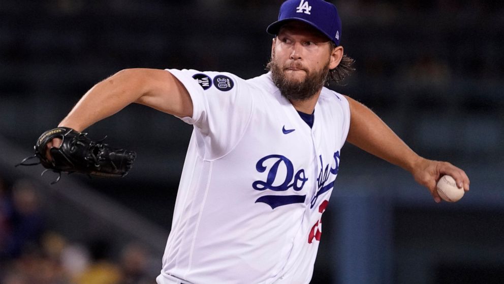 Los Angeles Dodgers starting pitcher Clayton Kershaw throws to the plate during the first inning of a baseball game against the Colorado Rockies Friday, Sept. 30, 2022, in Los Angeles. (AP Photo/Mark J. Terrill)