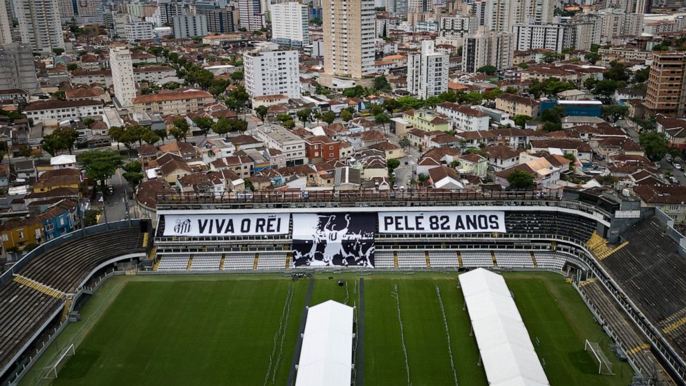 Giant banners that read in Portuguese: "Long live King Pele, 82 years", are displayed in the stands of the Vila Belmiro stadium, home of the Santos soccer club, where Pele's funeral will take place, in Santos, Brazil, Saturday, Dec. 31, 2022. Pele, w