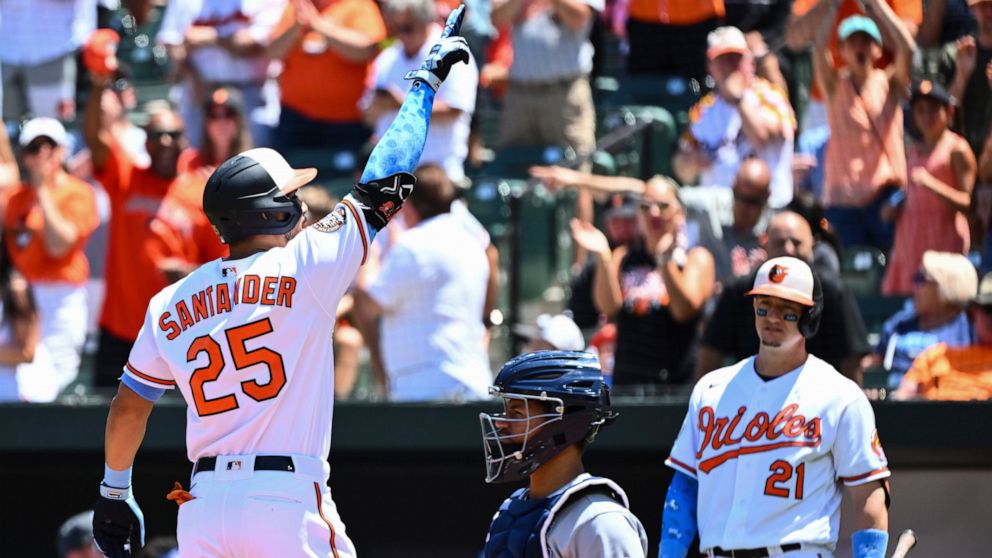 Baltimore Orioles' Anthony Santander (25) gestures after hitting a solo home run against Tampa Bay Rays starting pitcher Corey Kluber during the first inning of a baseball game, Sunday, June 19, 2022, in Baltimore. (AP Photo/Terrance Williams)
