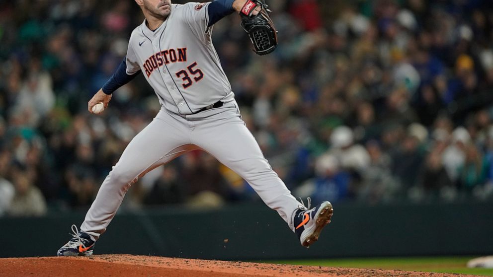 Houston Astros starting pitcher Justin Verlander throws against the Seattle Mariners during the sixth inning of a baseball game, Saturday, April 16, 2022, in Seattle. (AP Photo/Ted S. Warren)