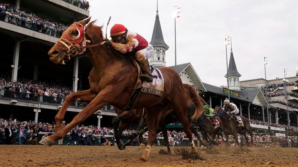 FILE -Rich Strike (21), with Sonny Leon aboard, wins the 148th running of the Kentucky Derby horse race at Churchill Downs Saturday, May 7, 2022, in Louisville, Ky. Kentucky Derby winner Rich Strike is the third betting choice on the morning line for